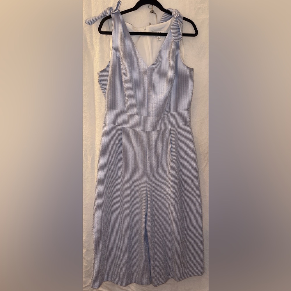 Elle bow-shoulder jumpsuit pin strip blue and white. Crop at the ankle jumpsuit
